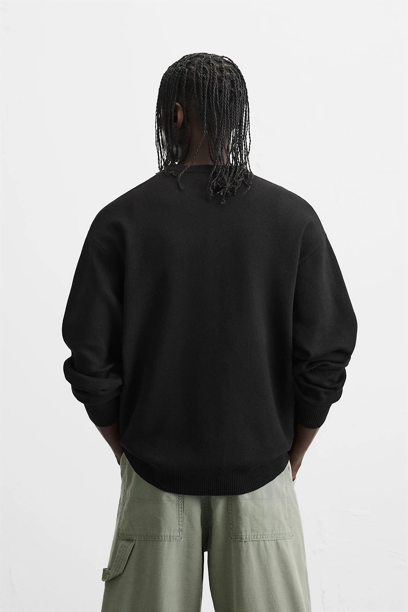 SOFT TEXTURED KNIT SWEATER