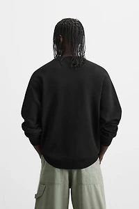 SOFT TEXTURED KNIT SWEATER