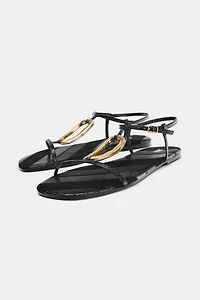 FLAT SANDALS WITH METALLIC APPLIQU