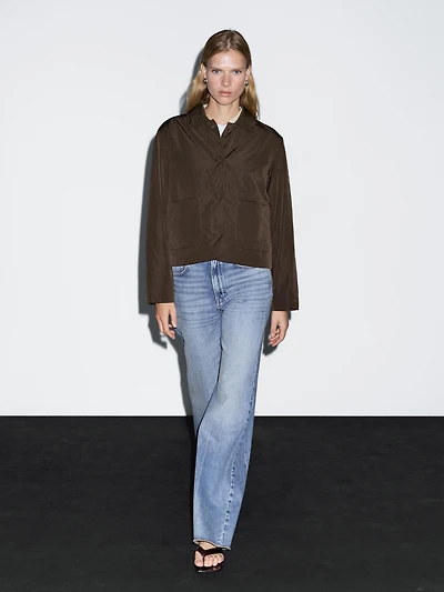 Cropped puffer jacket with covered buttons