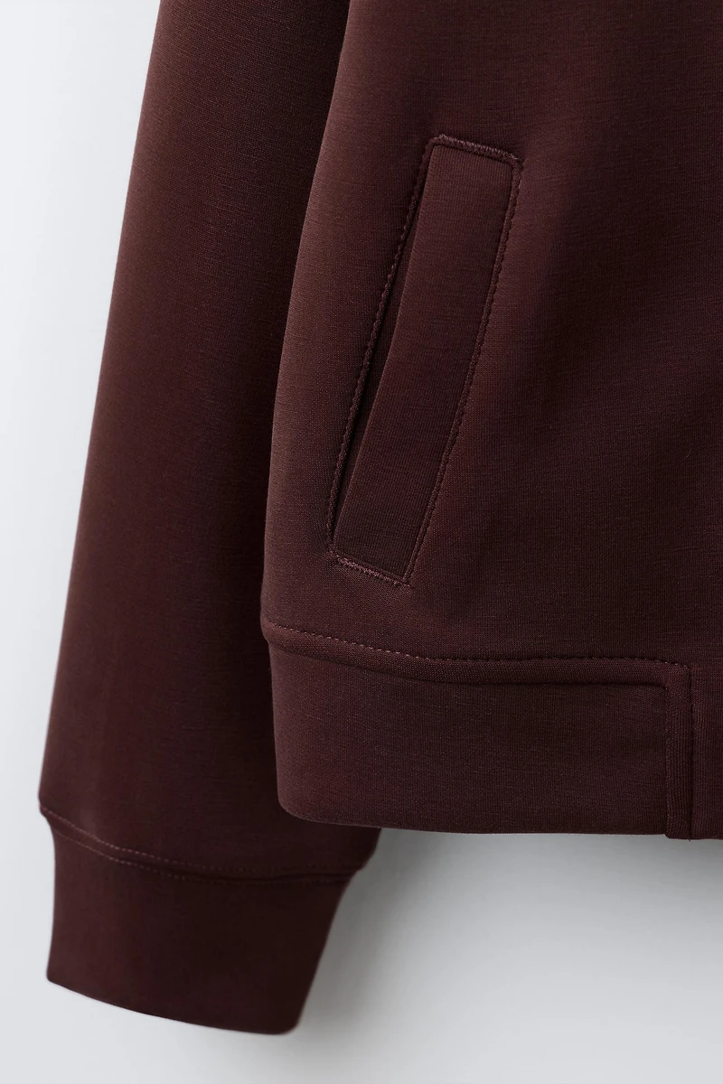 SPORTY JACKET WITH RAISED TEXT