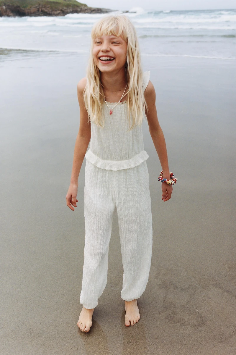 LONG RUFFLED JUMPSUIT