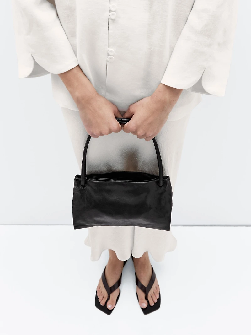 Small nappa leather bag with compartments