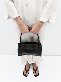 Small nappa leather bag with compartments