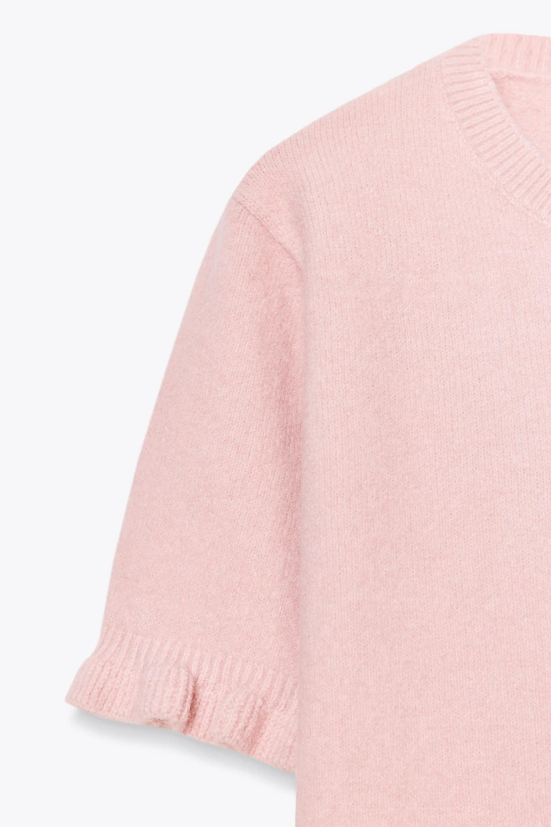 RUFFLED SHORT SLEEVE KNIT SWEATER