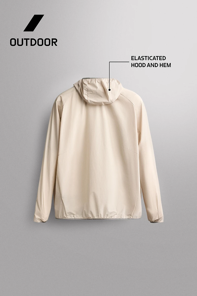TECHNICAL WINDBREAKER JACKET
