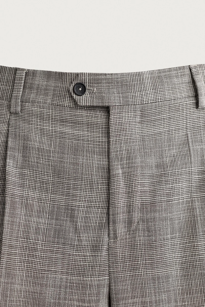 PANTALON DE COSTUME À CARREAUX ET PLIS EN LAINE