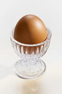 GLASS EGG CUP WITH A RAISED GEOMETRIC DESIGN