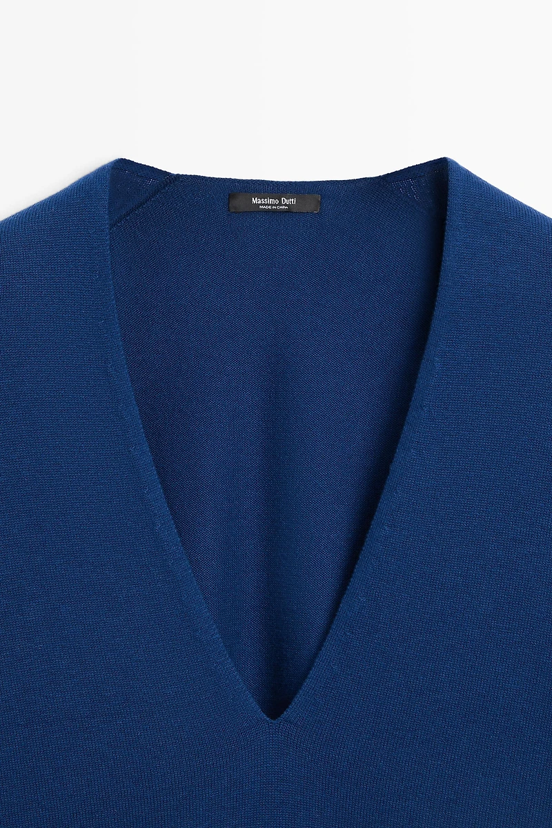Pull rayé en maille col V