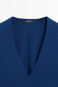 Pull rayé en maille col V