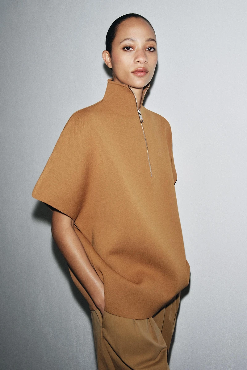 ZIPPERED KNIT CAPE TOP