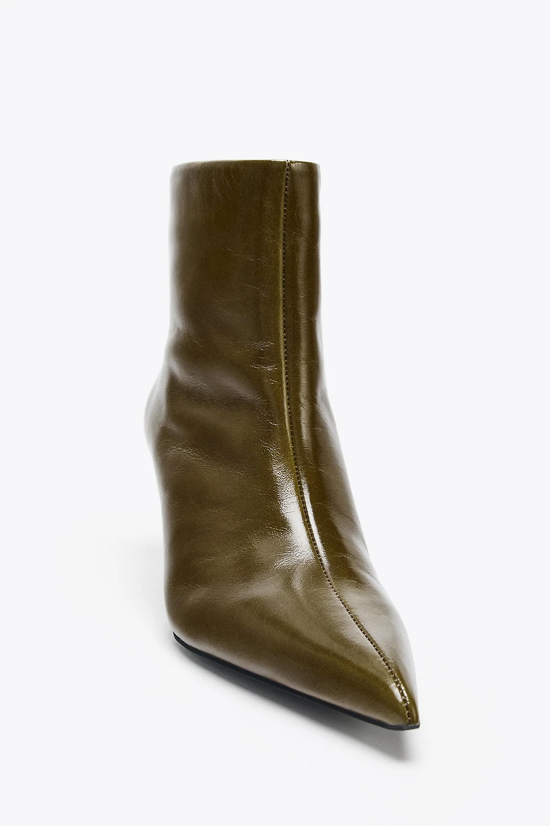 LEATHER CURVED HEEL ANKLE BOOTS