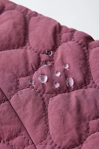 VESTE MATELASSÉE ÉTIQUETTE DÉPERLANTE