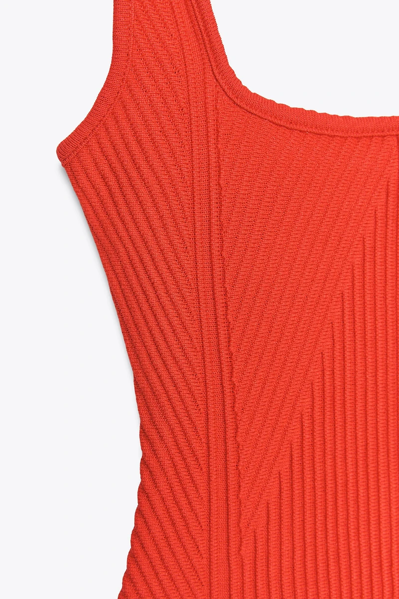 TEXTURED STRAPPY BODYSUIT