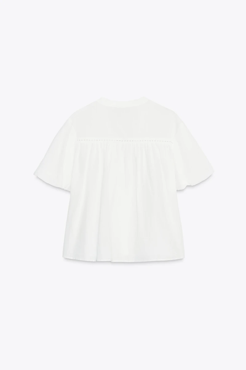 BLOUSE À MANCHES BOUFFANTES
