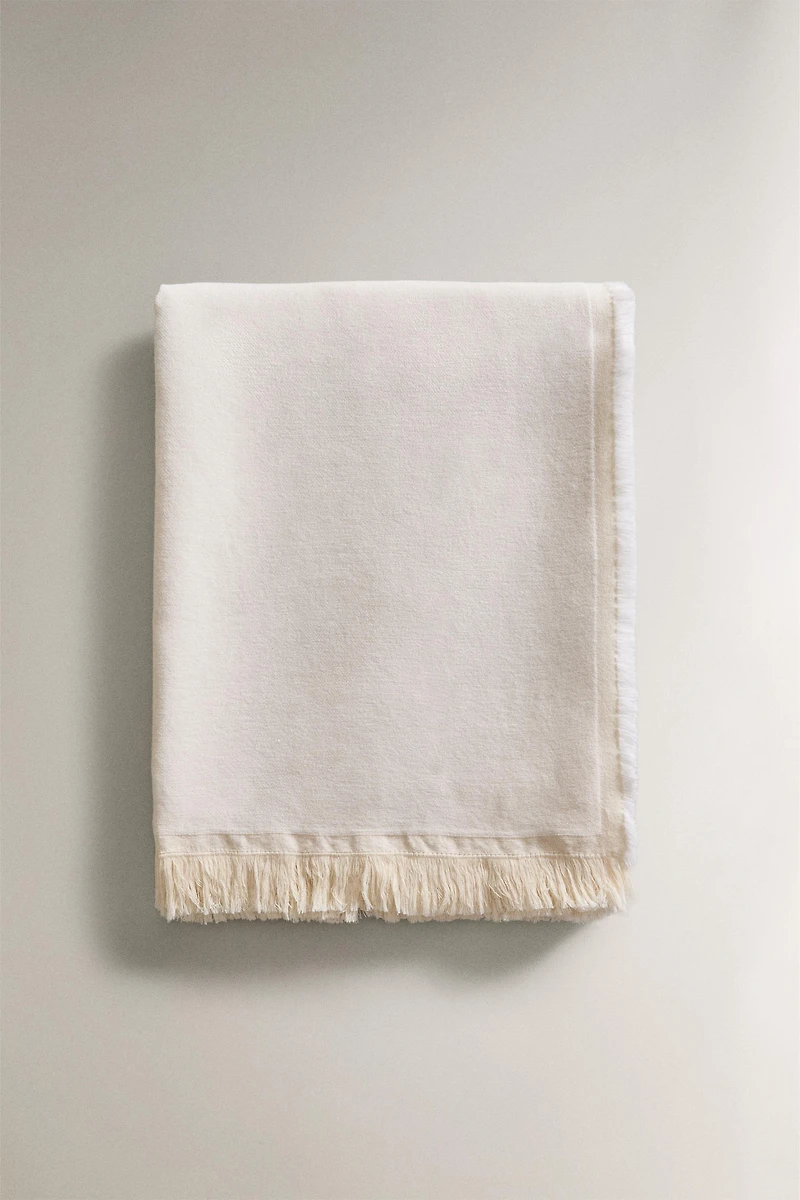 DECORATIVE FRINGED BLANKET