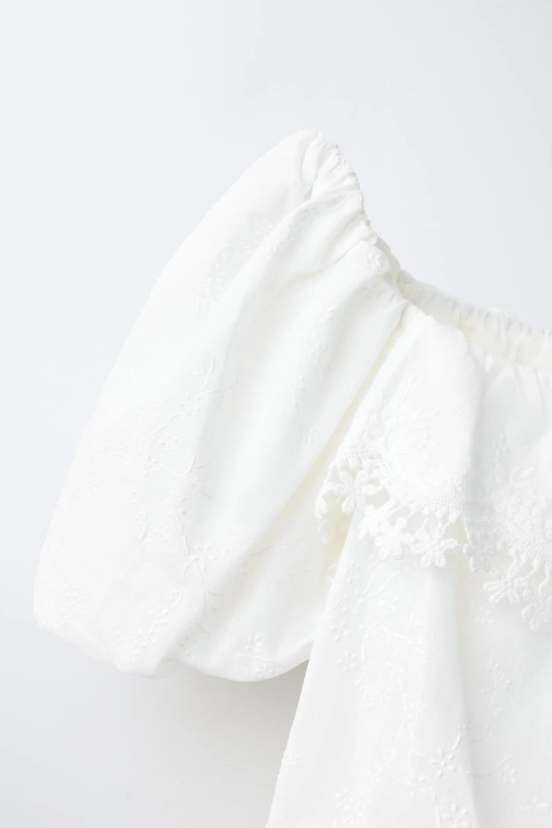 EMBROIDERED PUFFY TOP