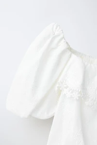 EMBROIDERED PUFFY TOP