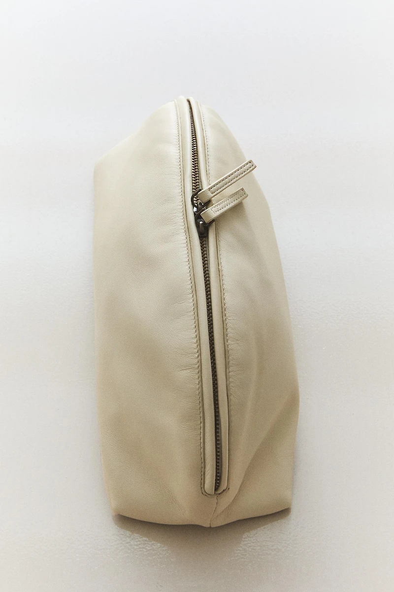 HALF-MOON LEATHER MAKEUP BAG