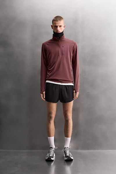 COMBINATION POCKET QUARTER-ZIP SWEATSHIRT
