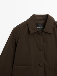 Cropped puffer jacket with covered buttons