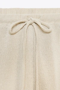CUT KNIT PANTS