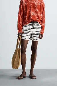 OTIS KWAME KYE QUAICOE PRINTED MID-LENGTH SWIMSUIT