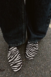 MOCASSINS EN CUIR À IMPRIMÉ ANIMALIER