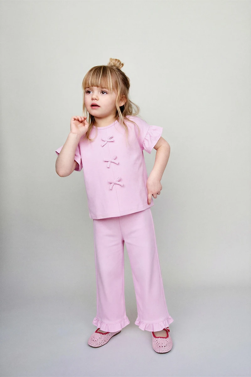 BOW AND RUFFLE T-SHIRT