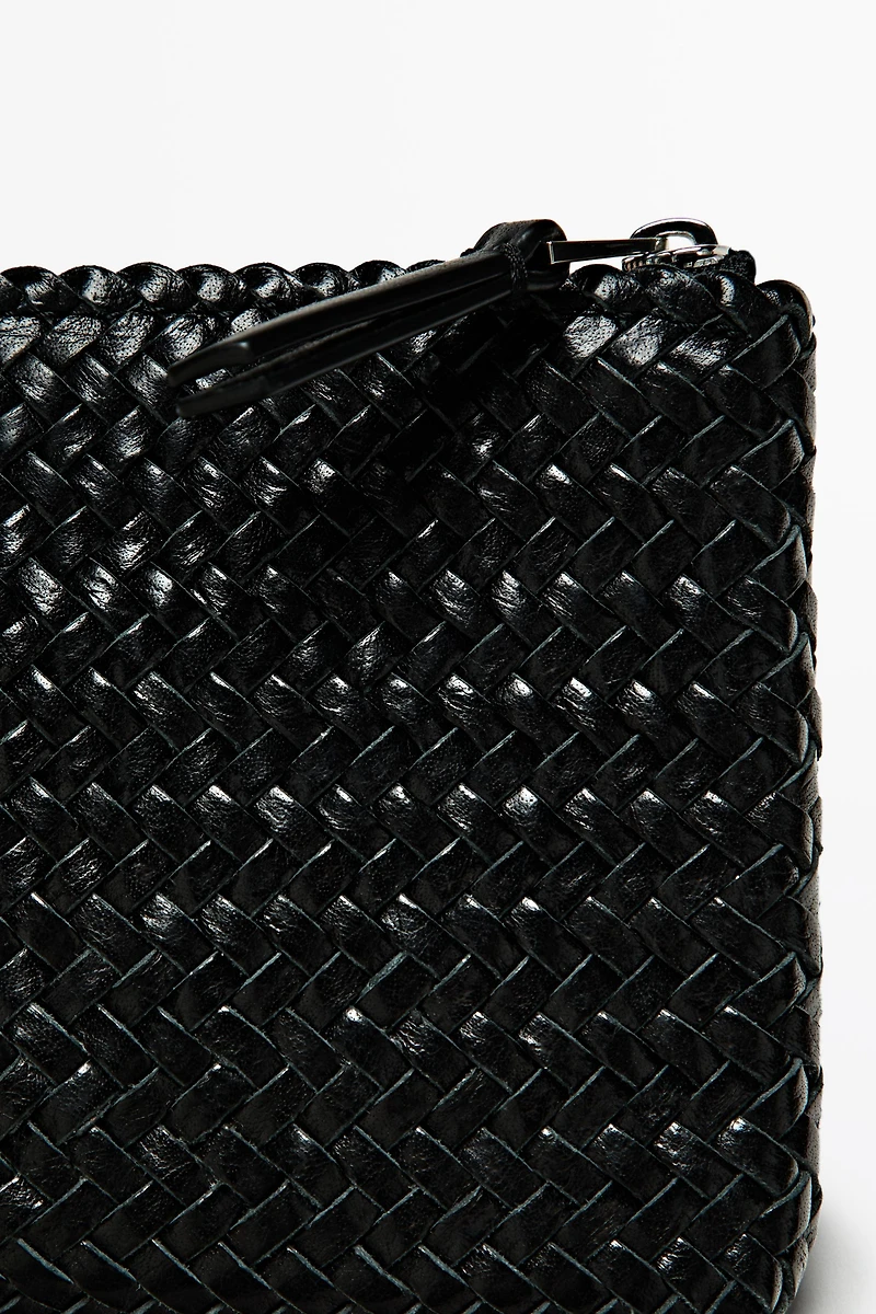 Sac pochette tressé en cuir nappa