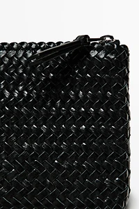 Sac pochette tressé en cuir nappa