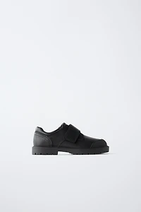 CHAUSSURES EN CUIR
