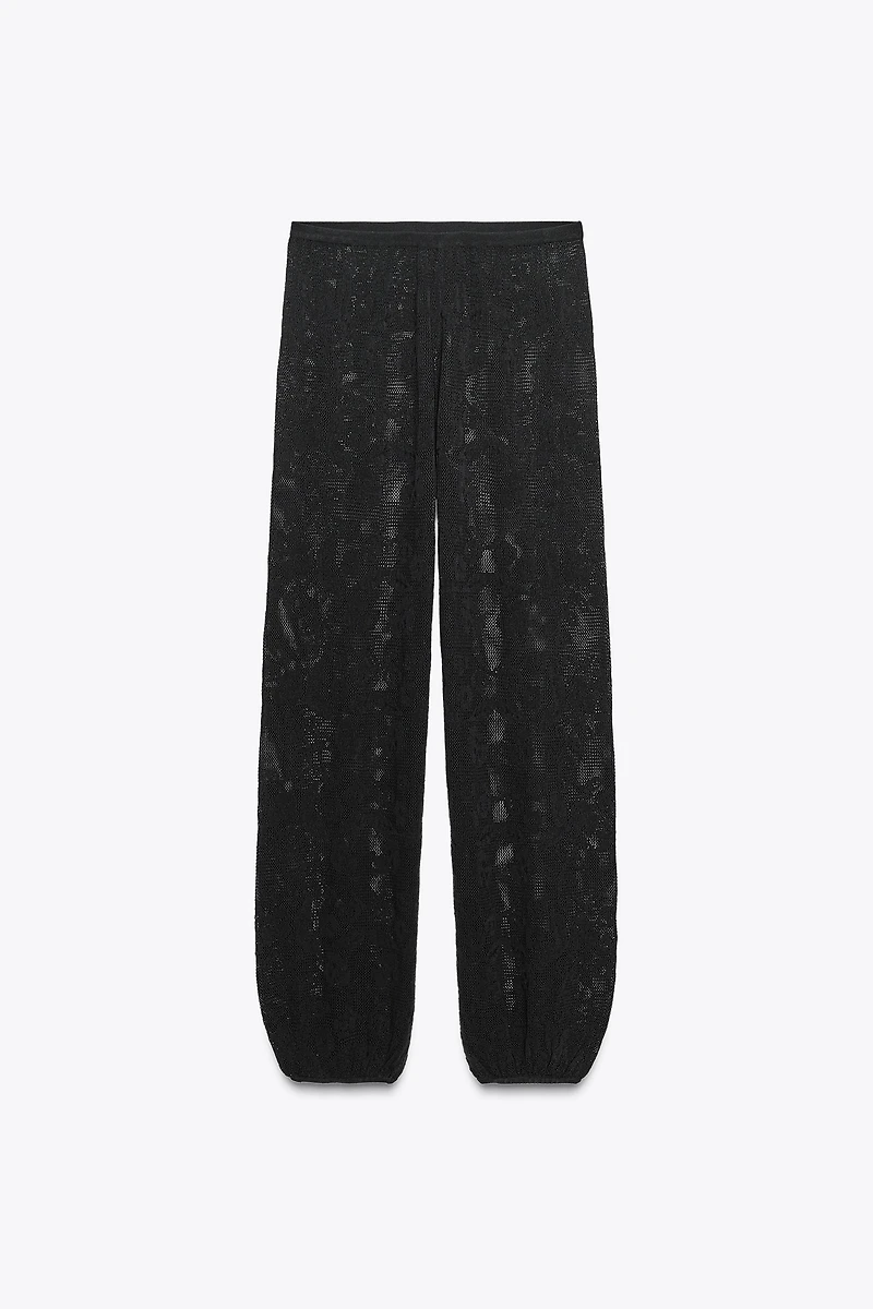 PANTALON EN MAILLE TEXTURÉE À FLEURS