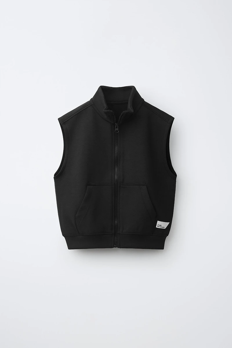 INTERLOCK VEST WITH LABEL