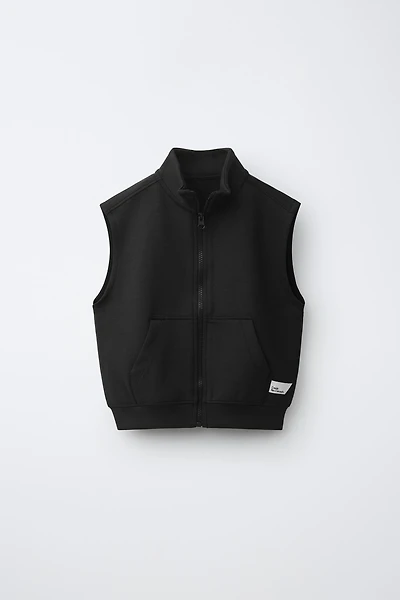 INTERLOCK VEST WITH LABEL