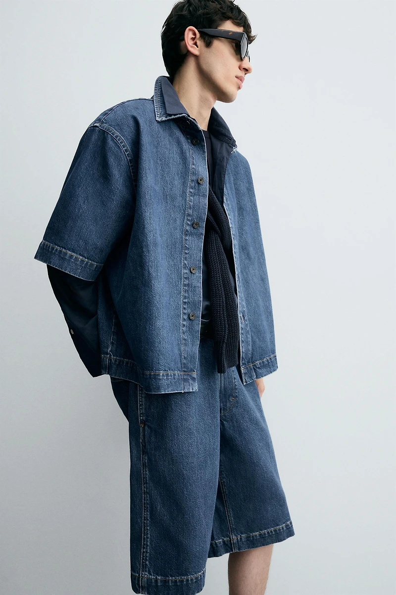 PLEATED RELAXED FIT DENIM SHORTS