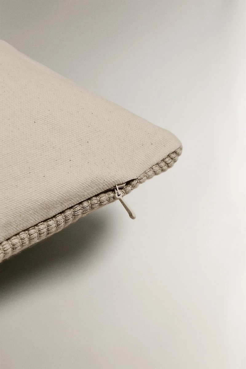 HOUSSE DE COUSSIN TRESSÉE