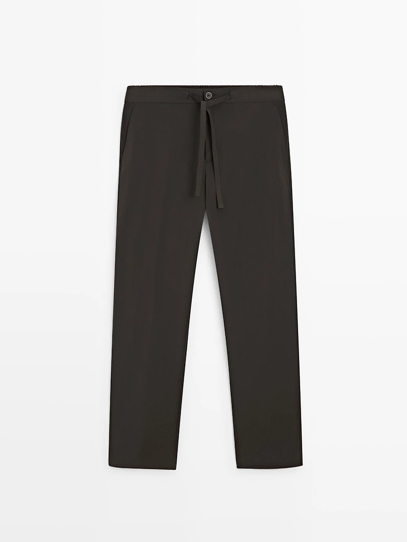 Total look technical trousers