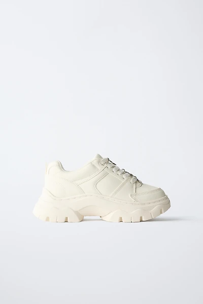 THICK-SOLED SNEAKERS WITH CHARMS