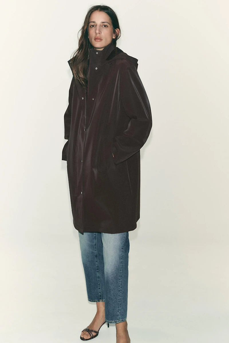 VESTE ENDUITE À CAPUCHE COUPE-VENT