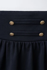 FROG FASTENING AND BUTTON SKIRT