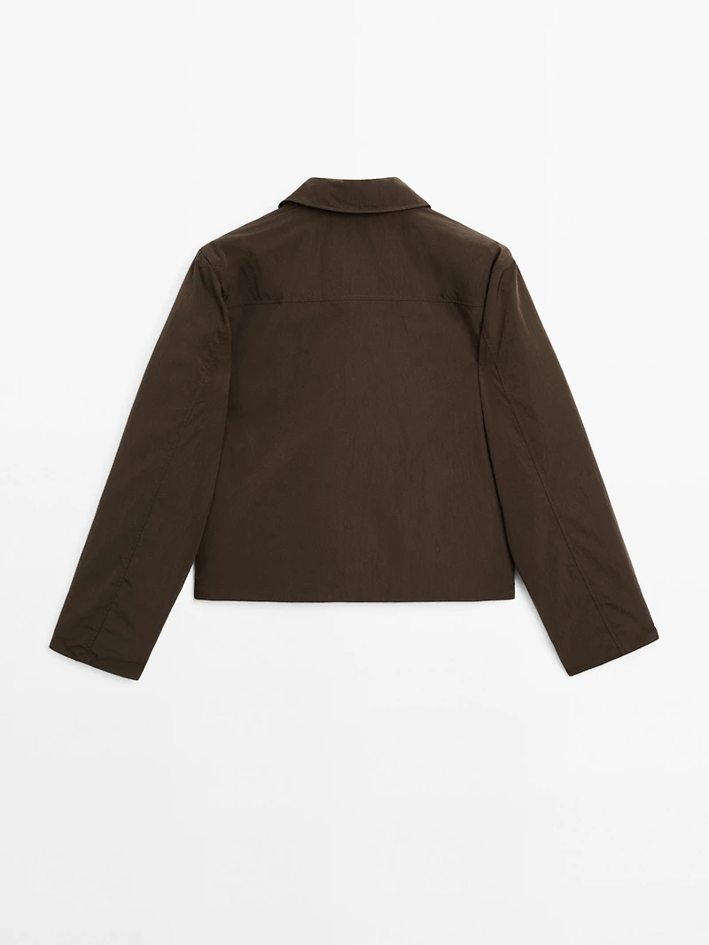 Cropped puffer jacket with covered buttons