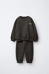 JOGGING SET SWEATSHIRT AND PANTS EMBROIDERED TEXT
