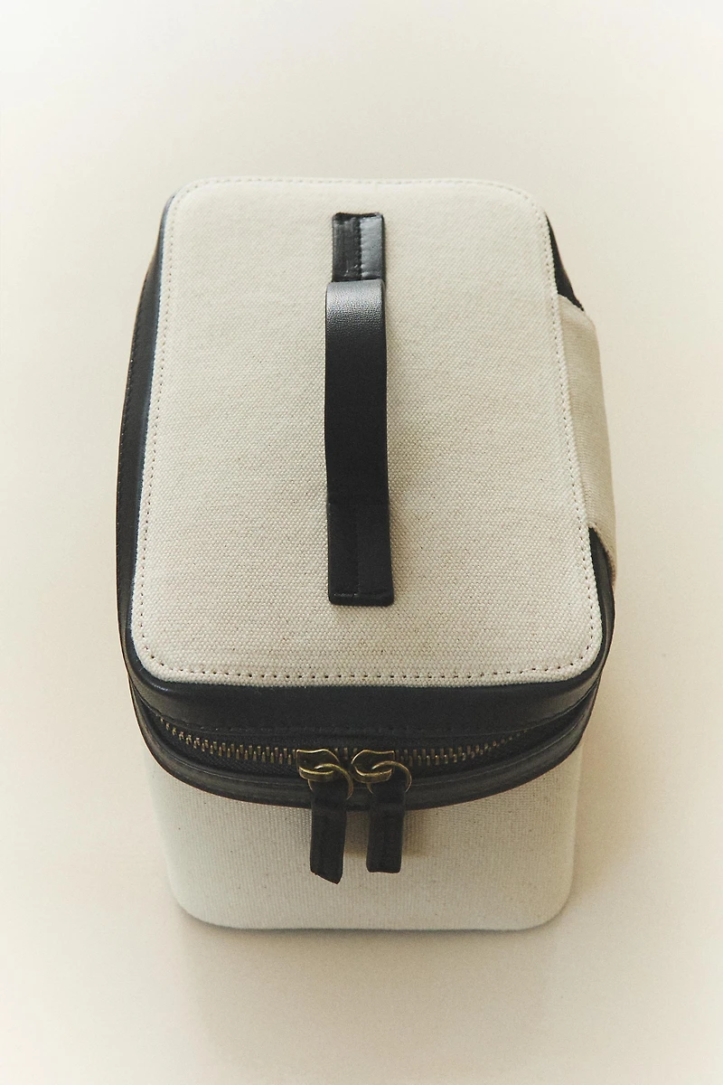 RIGID CANVAS AND LEATHER MAKEUP BAG