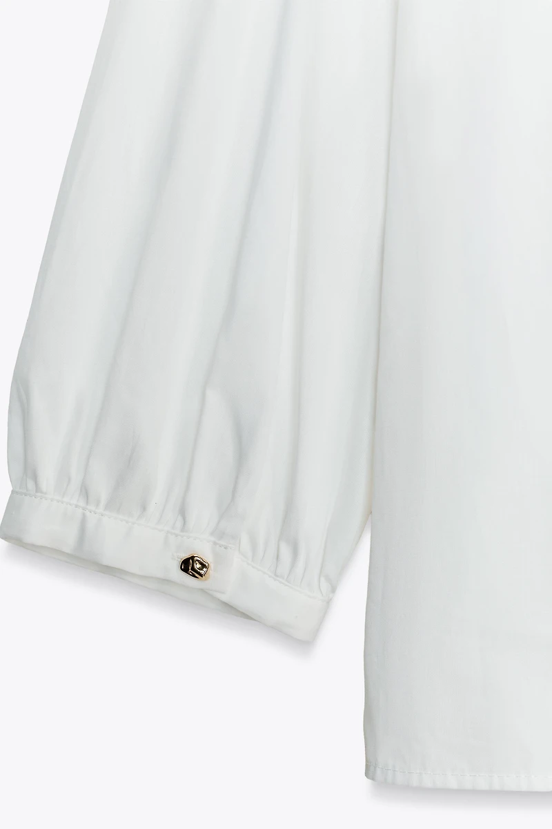 CHEMISE EN POPELINE À VOLANTS