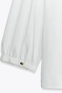 CHEMISE EN POPELINE À VOLANTS