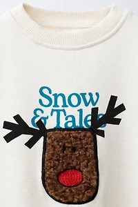 FAUX SHEARLING REINDEER PATCH SWEATSHIRT