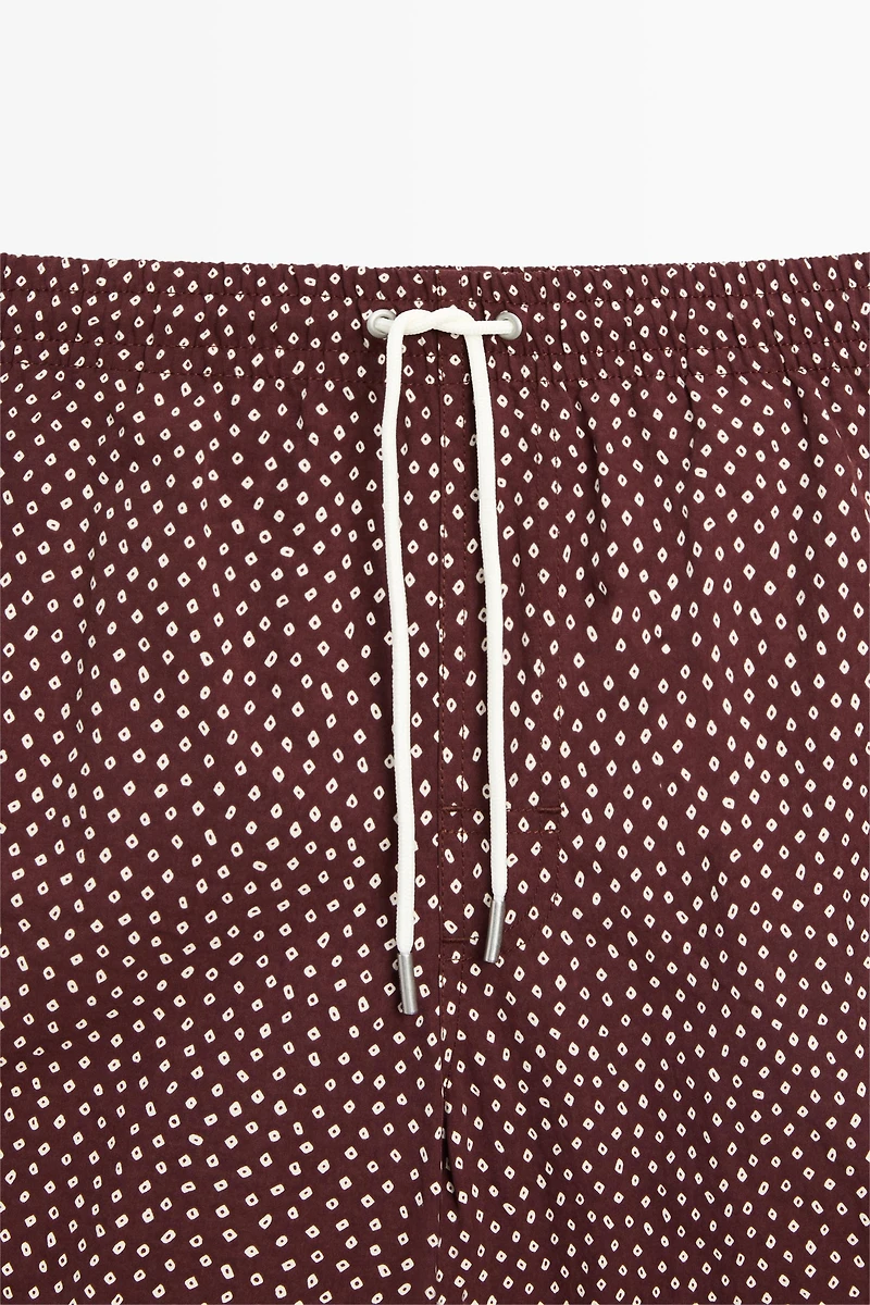 Polka dot print swimming trunks
