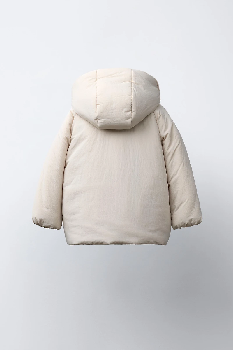 WATER REPELLENT PUFFER COAT WITH BOWS