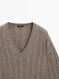 Cable-knit V-neck sweater